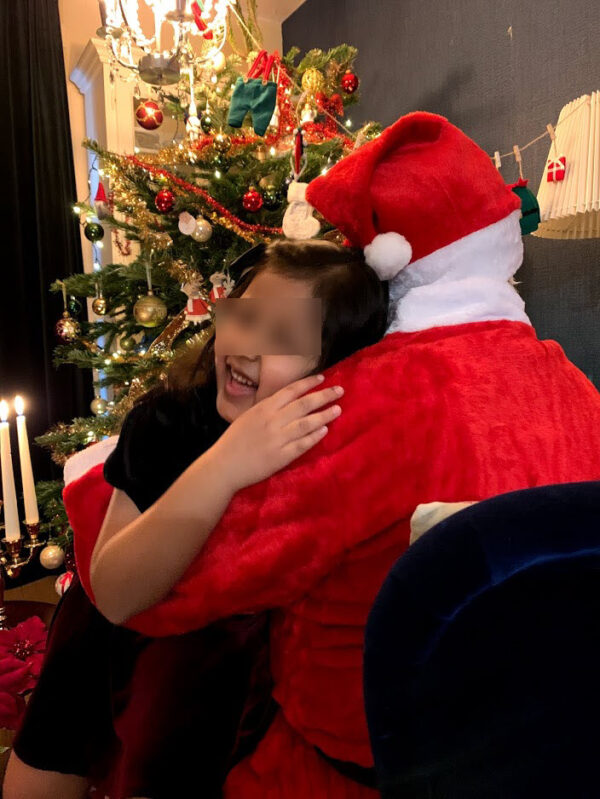 Theme based photography. Santa Claus with a girl.